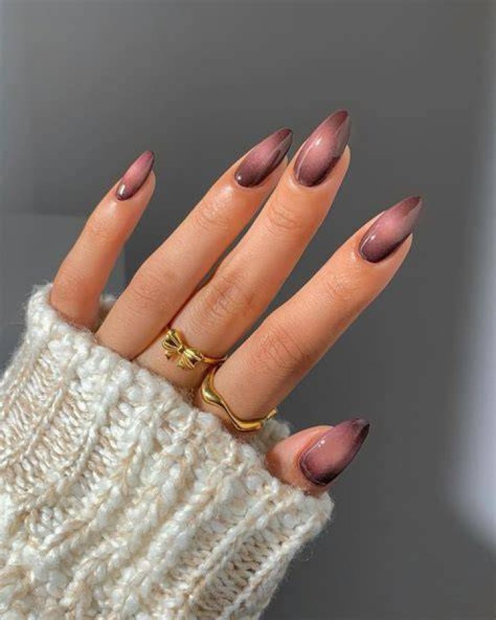Aura nails with blurred dreamy color cloud effect in purple and pink