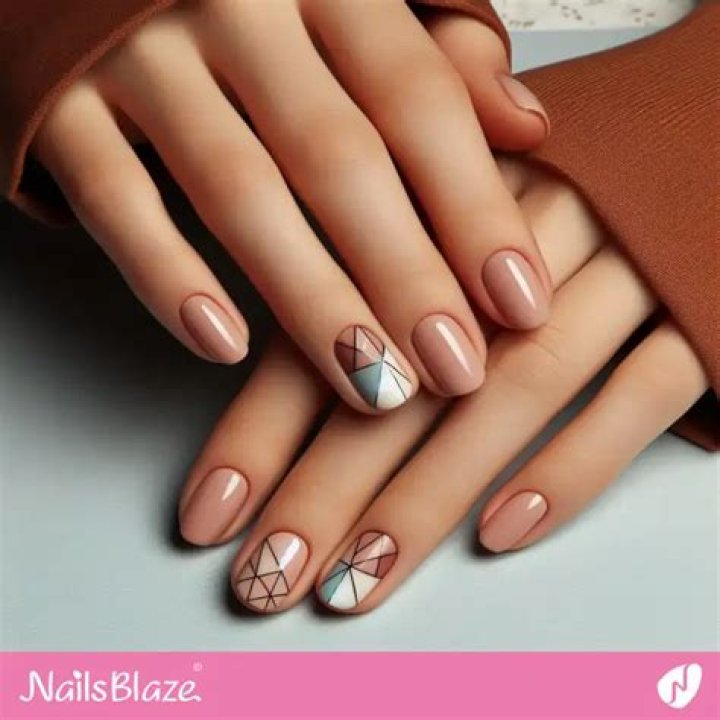 Negative space geometric minimalist nail art with clean lines and bare nail showing
